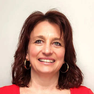 A headshot photo of Andria Theoharidis